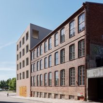 The univsersity occupies an old factory and silo