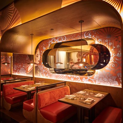 Booth seating against patterned wall