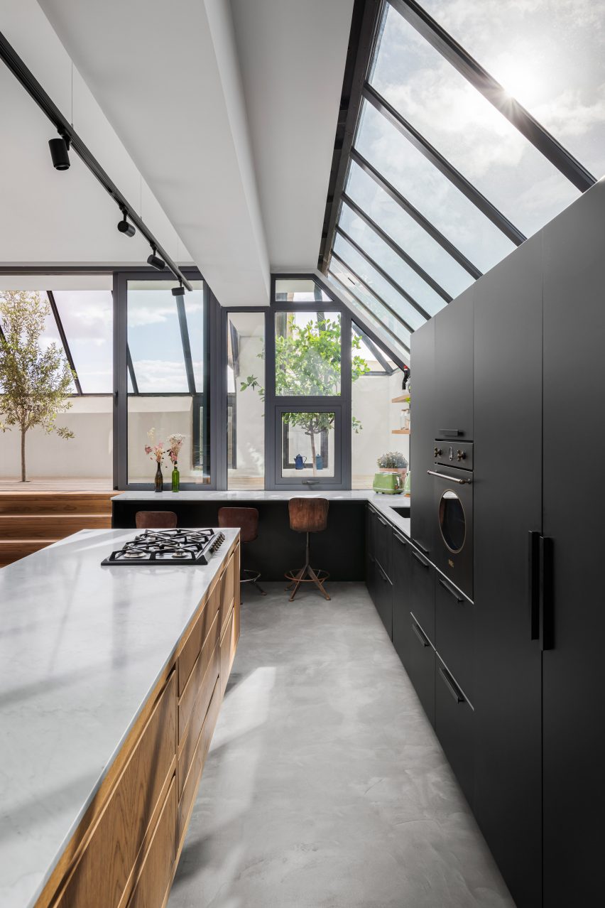 Kitchen inside La Serenissima house by Valentino Architects