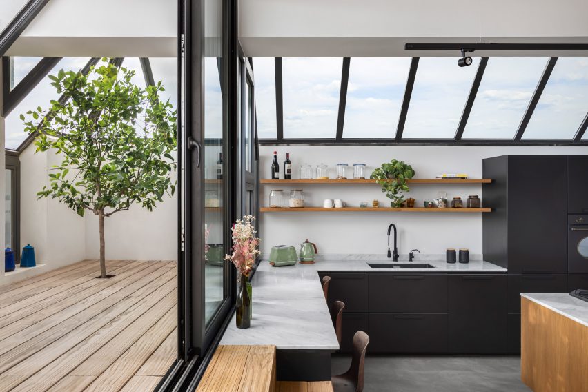 Kitchen inside La Serenissima house by Valentino Architects
