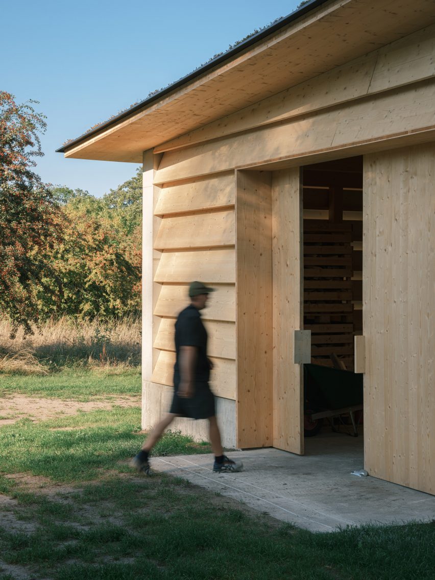 Entrance of wooden barn by Johan Sundberg