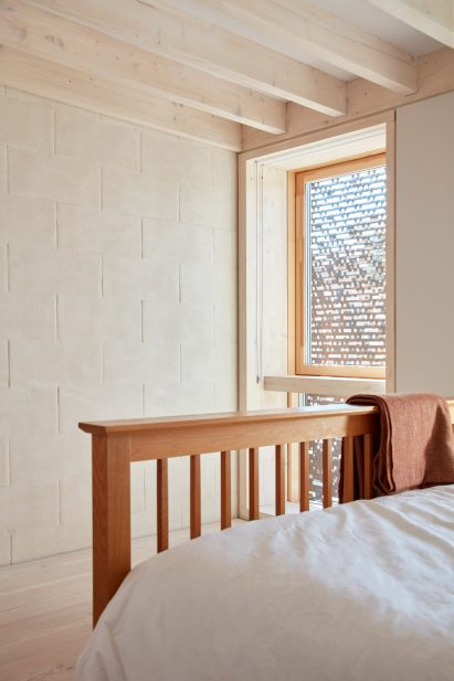 Bedroom with blockwork wall