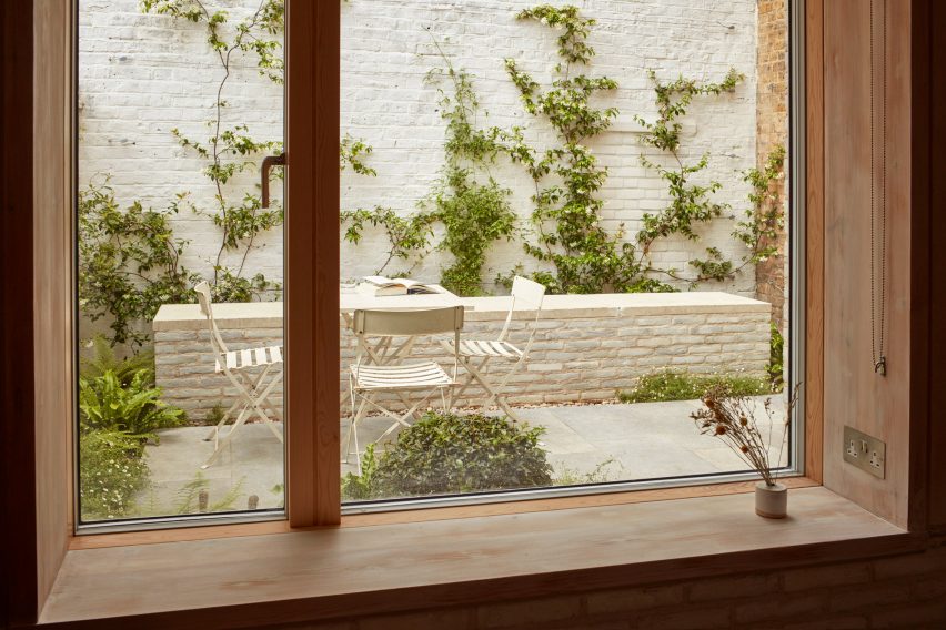 Window onto garden at Library House by Macdonald Wright Architects