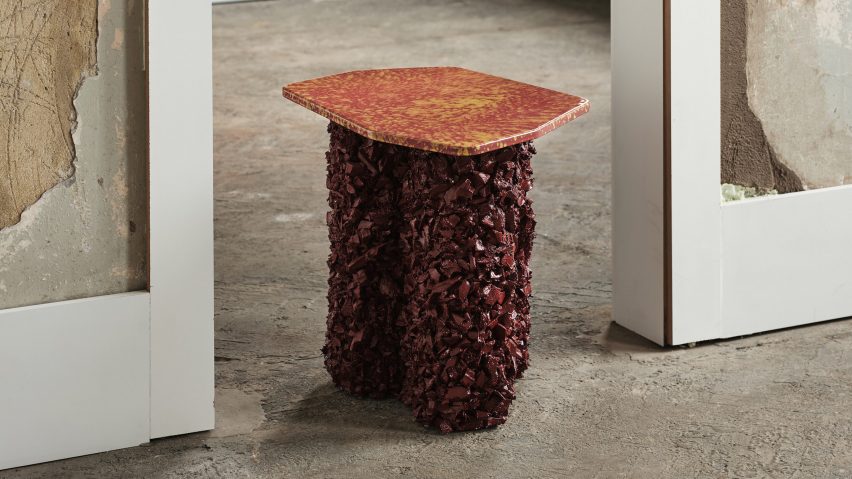 Craggy red and orange side table from Liquid Geology collection by CAN
