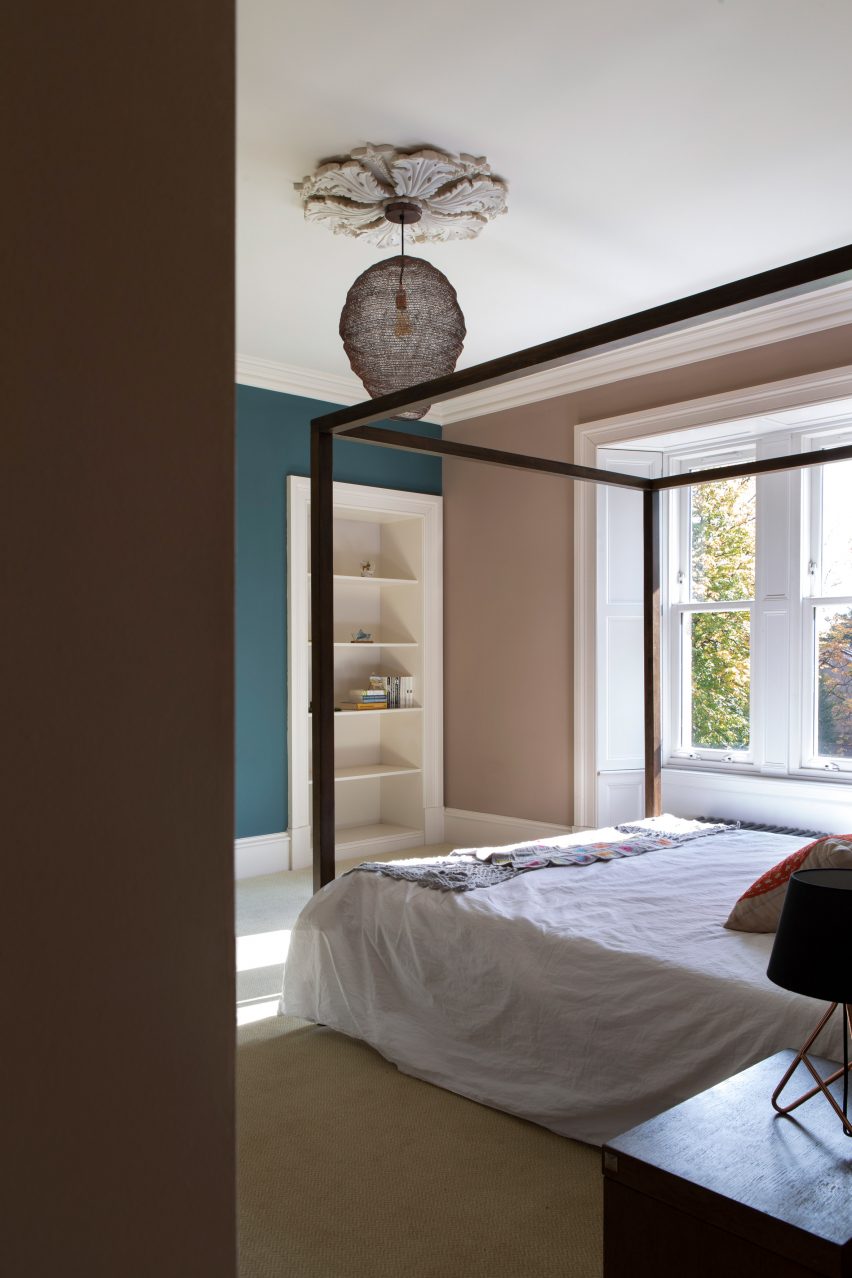 A double bed inside a house extension by Loader Monteith