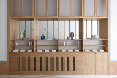 Wooden storgae space in MBS salon by ASKA
