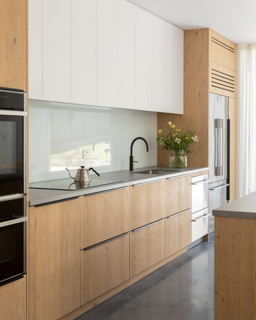 Hipped House is a home in Surrey that was designed by Oliver Leech Architects