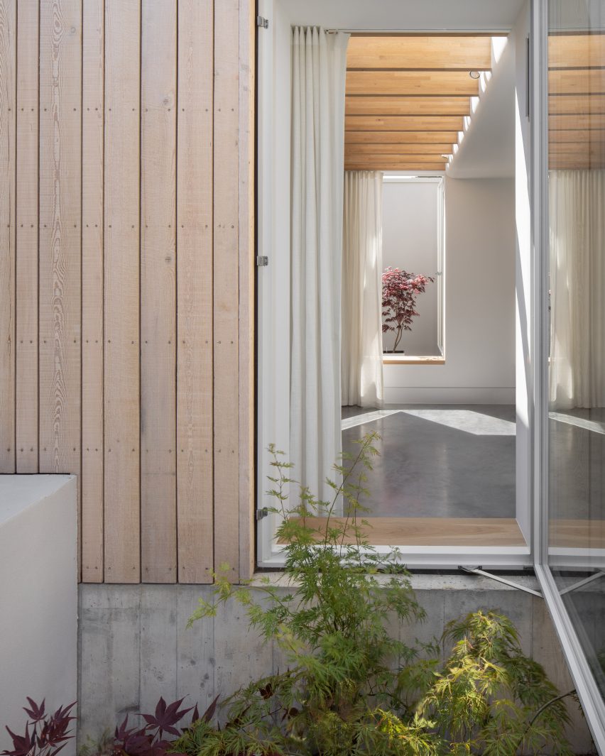Hipped House is a home in Surrey that was designed by Oliver Leech Architects