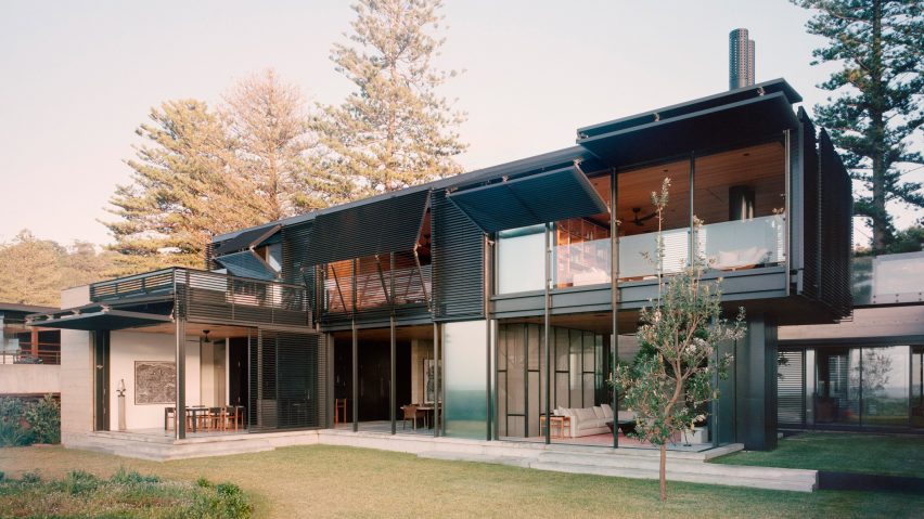 Image of the beach house with folded shutters