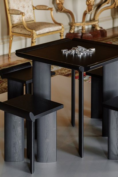 Cast aluminium dominoes on Open Code gaming table by Mac Collins at Harewood Biennial