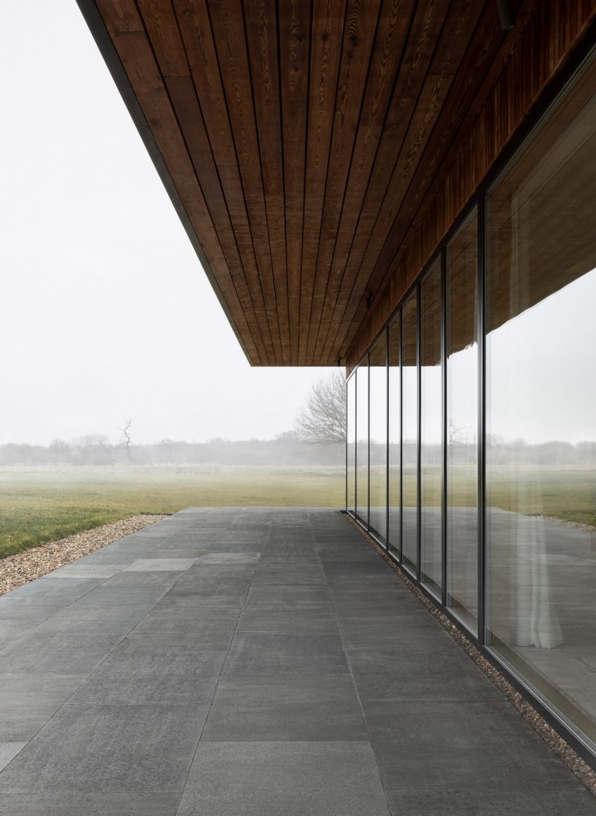Glazed exterior of holiday home by Norm Architects