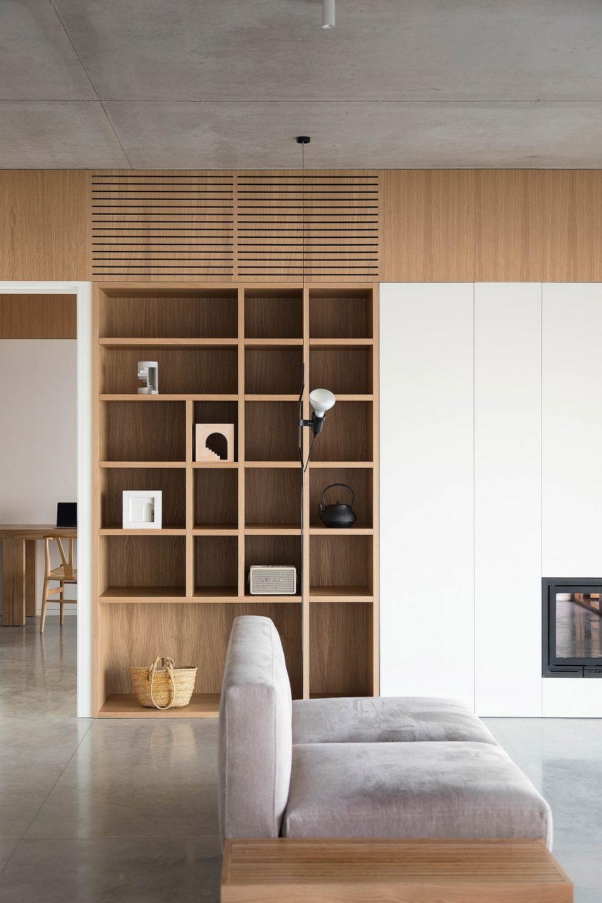 Living room with wooden shelving