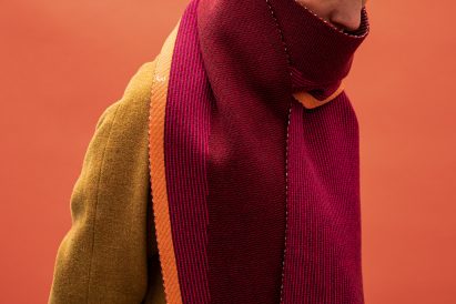 Temperature Textiles scarf in red, pink and orange with pattern recording projected temperature rise under climate change