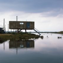 Redshank artist's studio by Lisa Shell raised above a tidal salt marsh, used to illustrate story about IPCC climate report