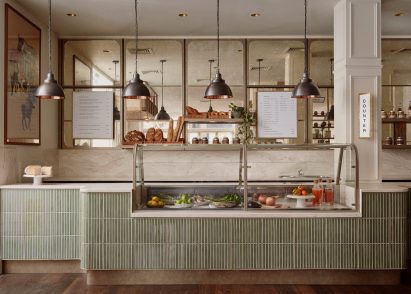 A green deli counter inside Sloane Street Deli
