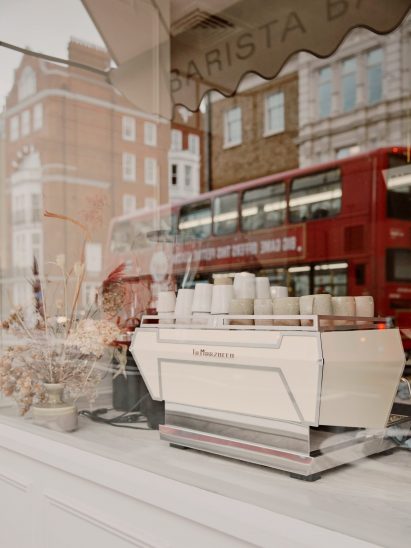 A coffee machine on a window ledge