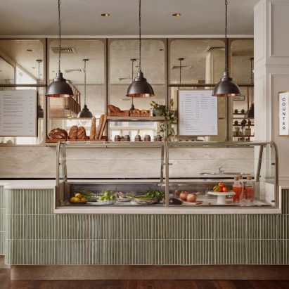 A green tiled deli bar at Sloane Street Deli