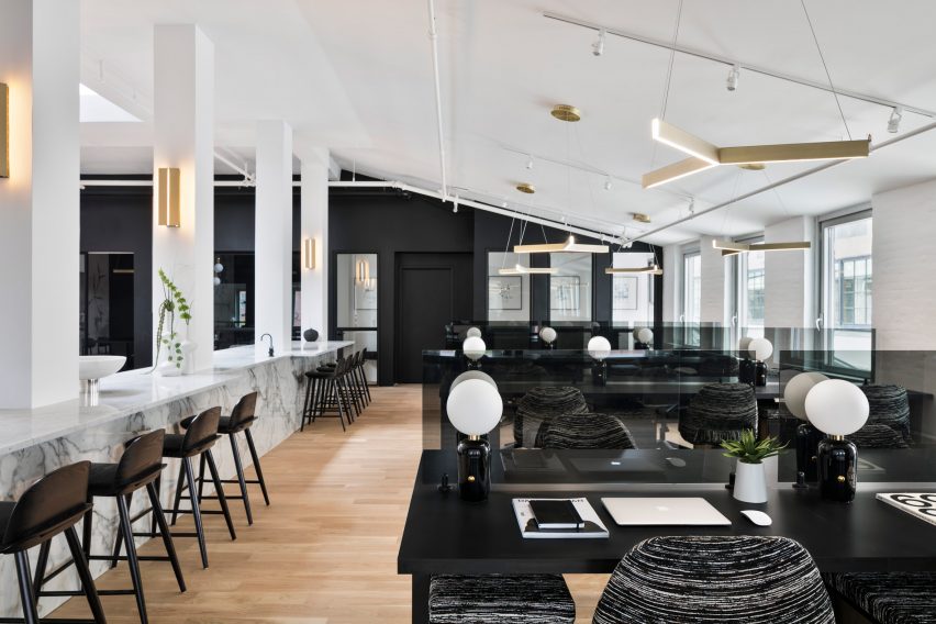 Open-plan desks and marble bar