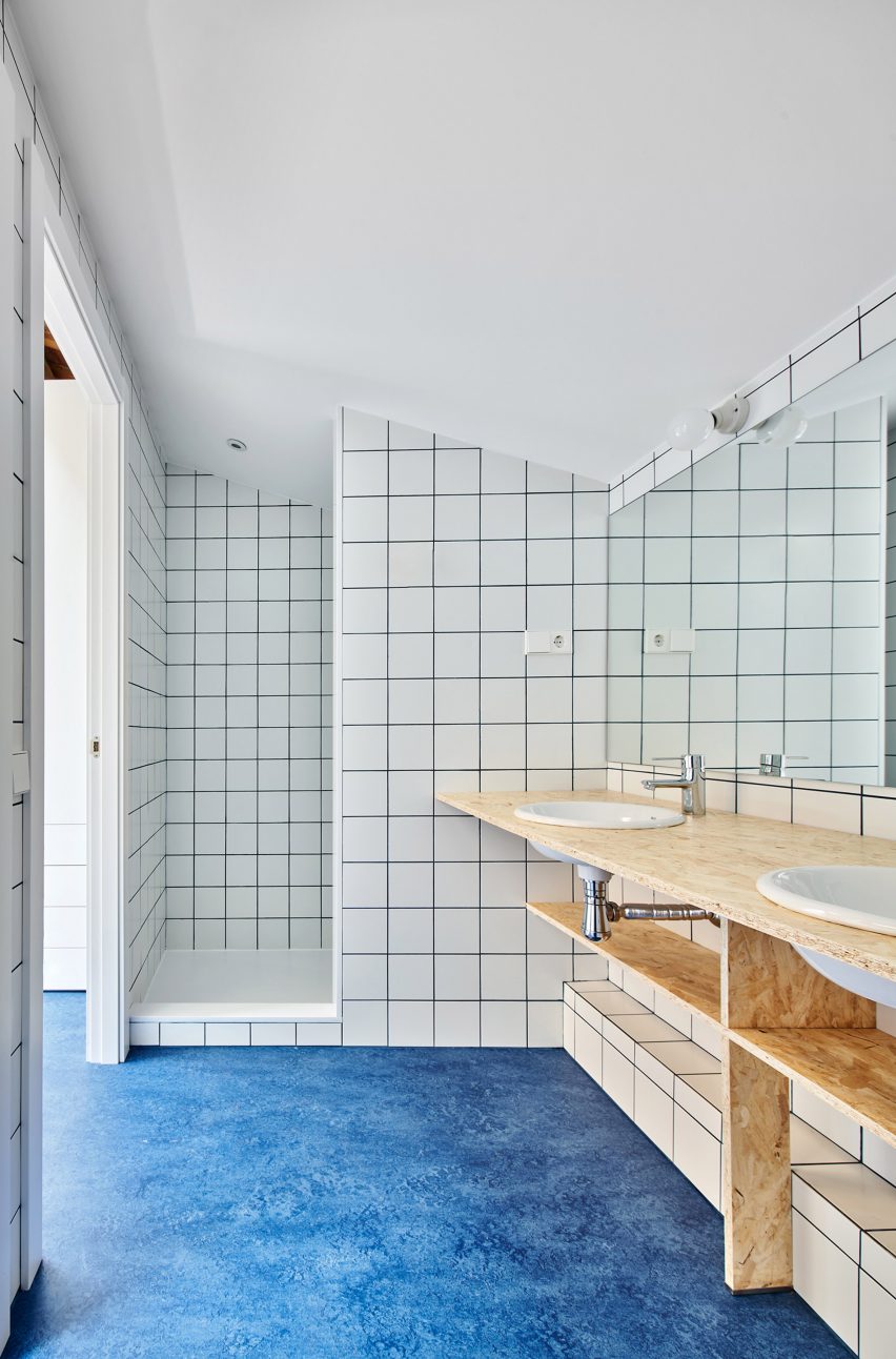White-tiled bathroom at 105JON
