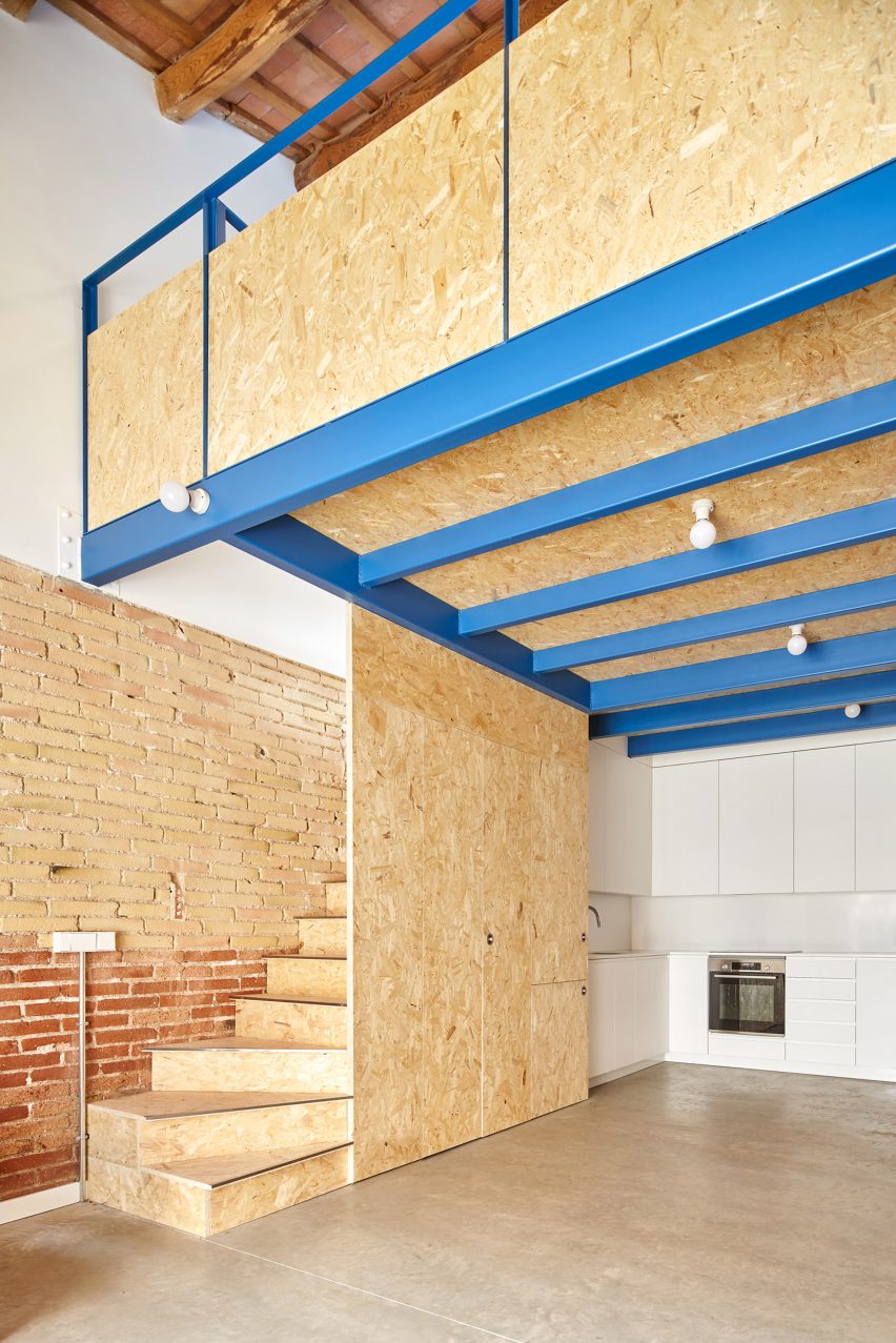 Open-plan living space with mezzanine