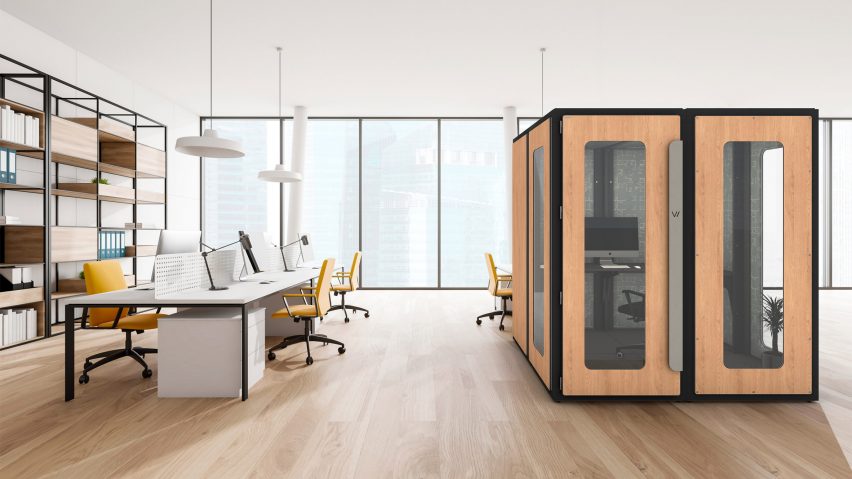 VicBooth Office by Vicoustic in oak finish walls with full length windows used in an open plan office with wooden floors