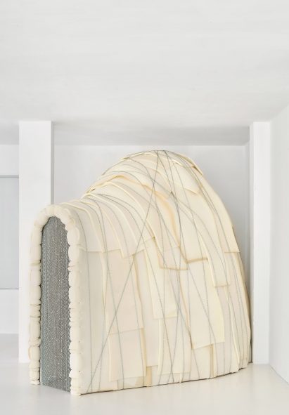 Igloo-shaped bedroom in bright white warehouse space designed by Takk