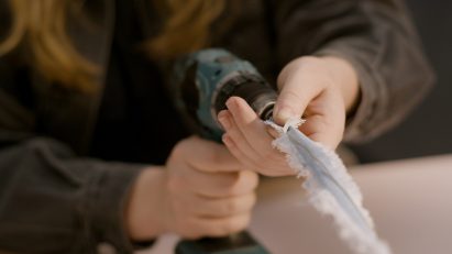 A photograph of a person making a new material during the Levi workshop