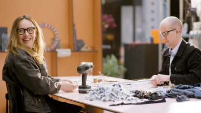 A photograph of people enjoying the denim workshop
