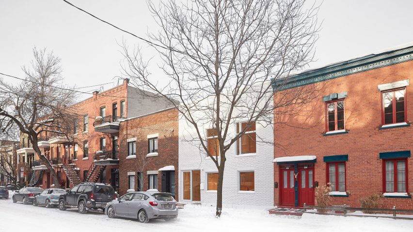 Jean Verville lines Montreal row house with sculptural plywood interiors