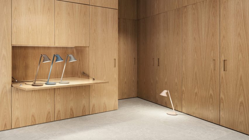 Four NJP Mini LED table lamps by Louis Poulsen in a wood-clad minimal office space