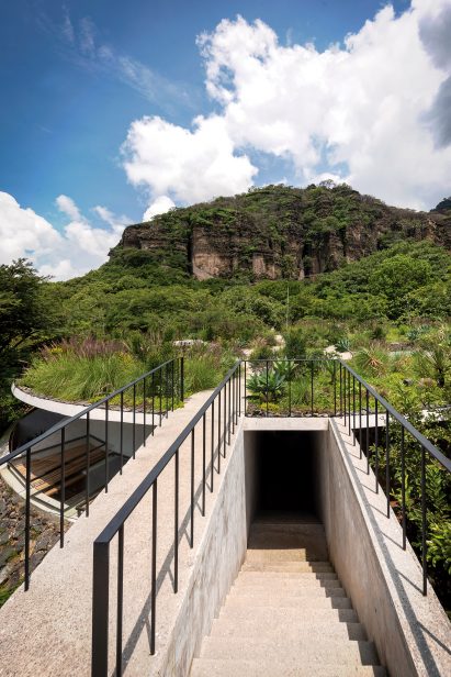 staircase with upper terrace and mountain in background