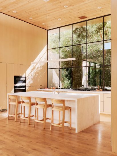 kitchen with tall windows and island