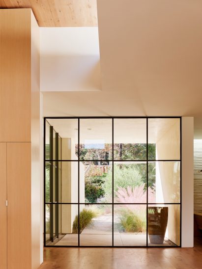 glass windows and stucco and wood ceiling