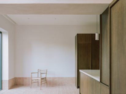 Chair on a brick floor in Aperture House