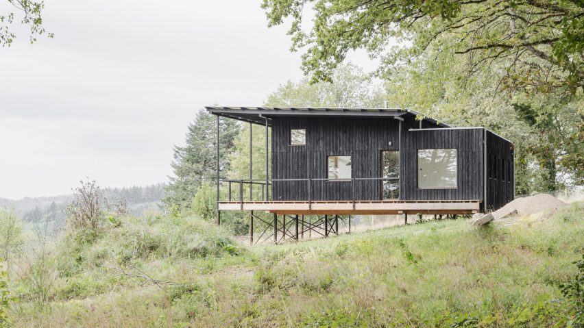 The wooden house is a timber home that was designed by Ciguë