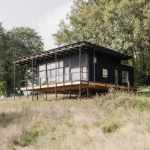 The wooden house is a timber home that was designed by Ciguë