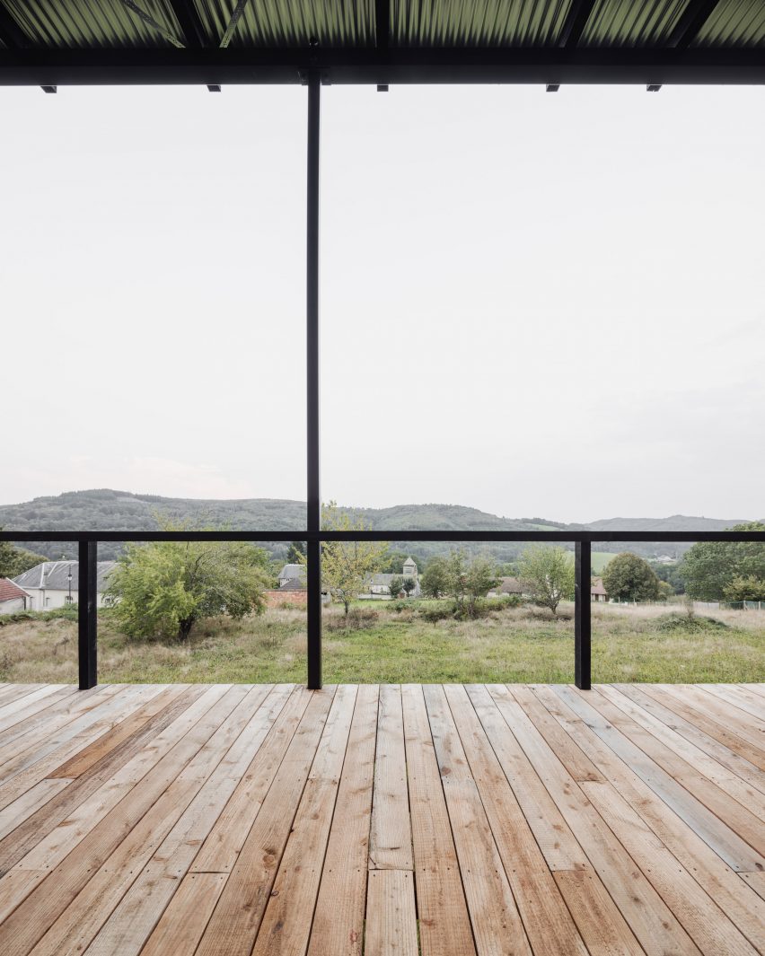The wooden house is a timber home that was designed by Ciguë