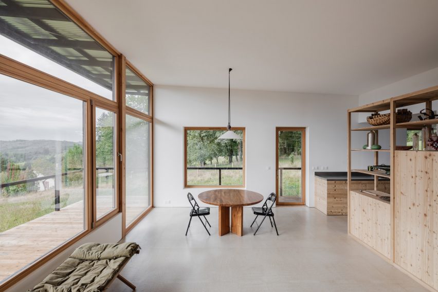 The wooden house is a timber home that was designed by Ciguë