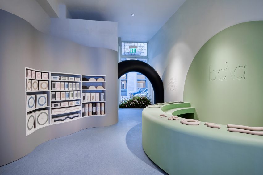 Store entrance behind a pale green counter