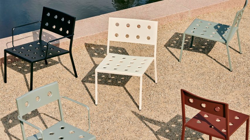 Multicoloured Balcony chairs by Hay on an outdoor area next to a pond
