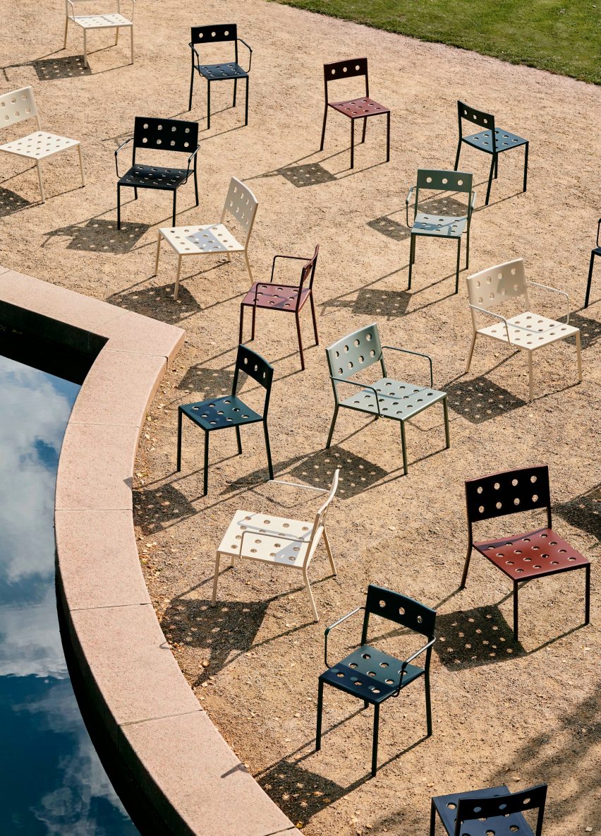 Multicoloured Balcony chairs by Hay on an outdoor area next to a pond