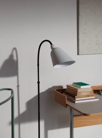 White Bellevue lamp next to a desk