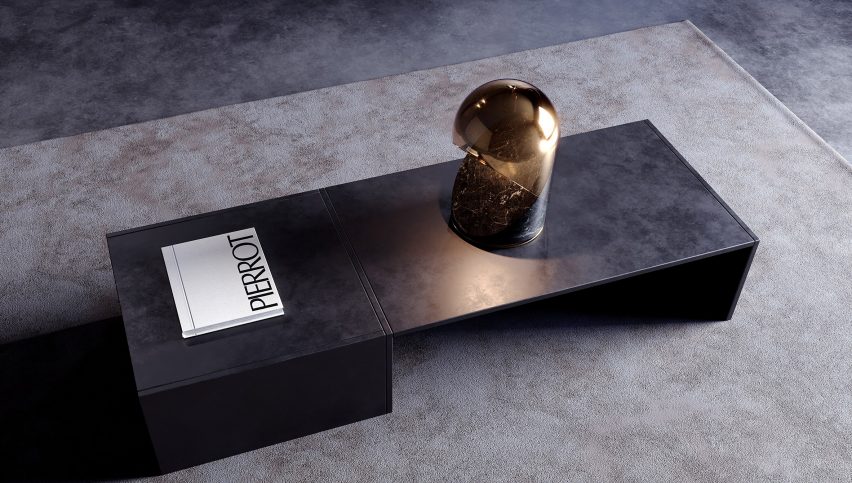 Top view of gold and black Cassiopea table lamp on a coffee table