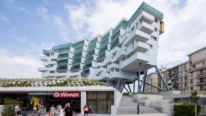 The Building Descending the Stairs pictured elevated above its surroundings