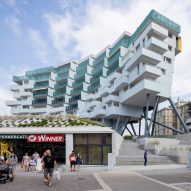 The Building Descending the Stairs pictured elevated above its surroundings