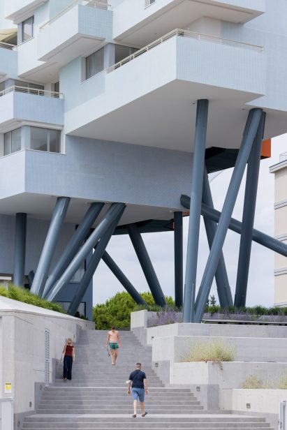Image of the underside of the The Building Descending the Stairs and its stilts
