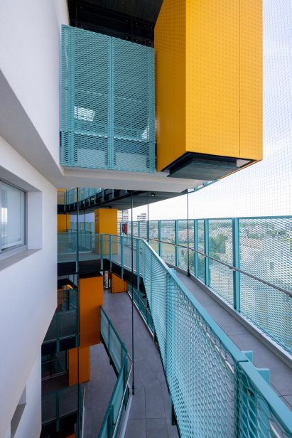 Image of the blue mesh walkways at the apartments