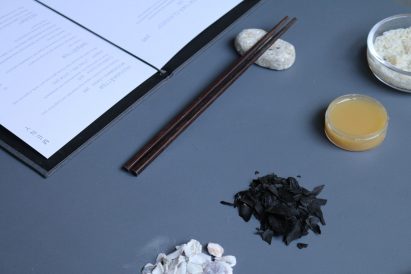 Chop sticks on a holder made from restaurant's food waste