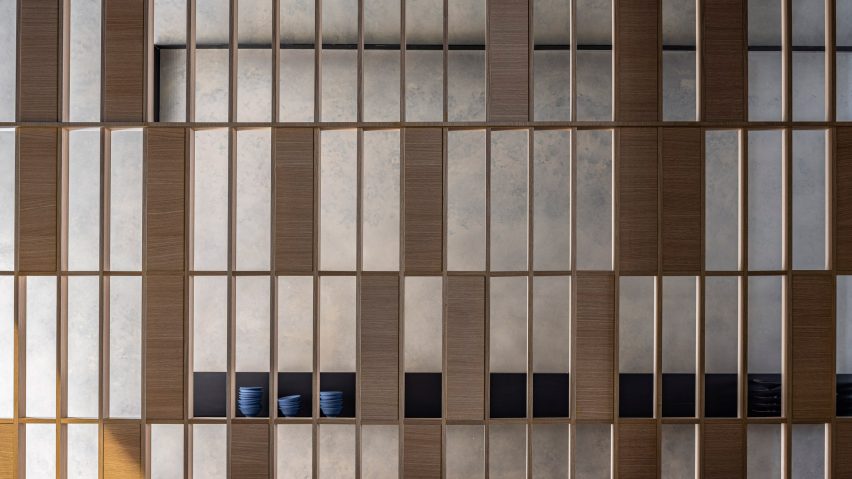 Gridded timber latticework in Hiba restaurant in Tel Aviv by Pitsou Kedem
