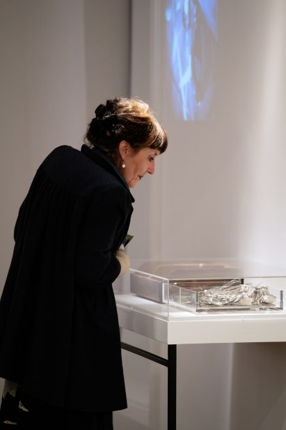 Visitor watching Ides of Utopia